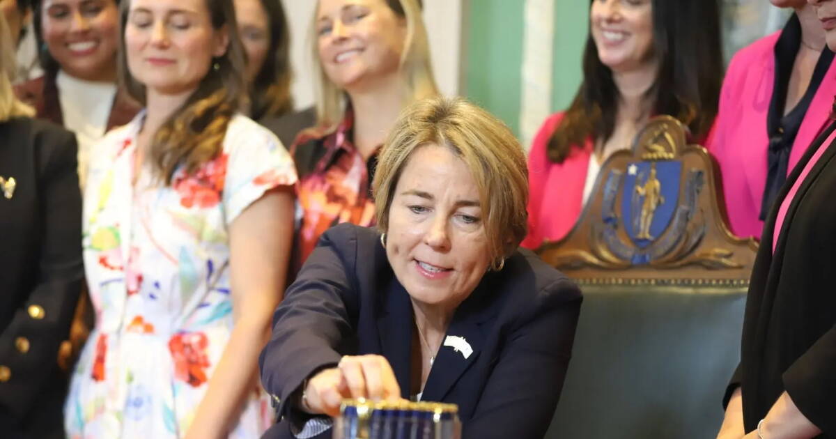 Signing new abortion law, Healey cites stories of 'anguish and heartache'